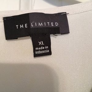 Black and white sleeveless blouse